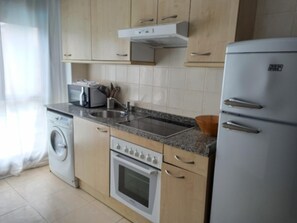 Microwave, oven, coffee/tea maker, high chair - One Bedroom Apartment (Llanes)