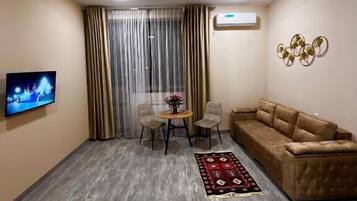 Family Suite with Balcony | Minibar, desk, laptop workspace, iron/ironing board (on request)