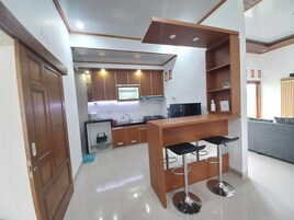 Family House | Private kitchen | Full-size fridge, stovetop, rice cooker, griddle