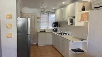 Fridge, microwave, stovetop, electric kettle