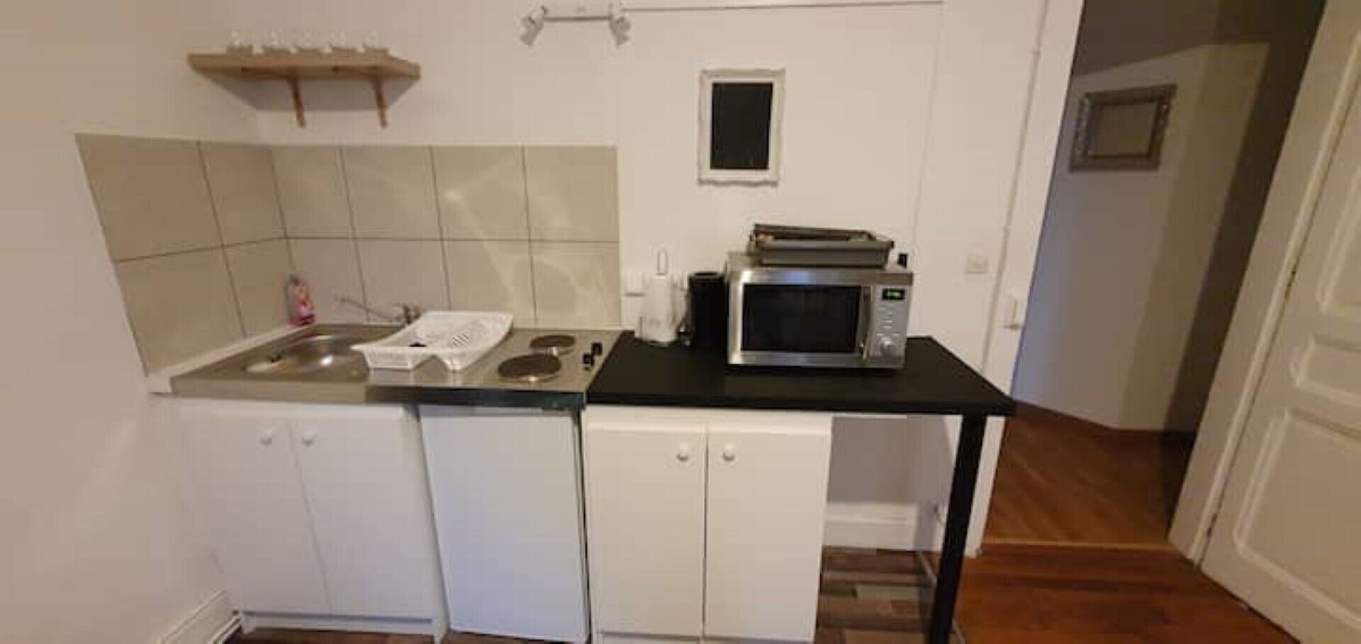 Fridge, stovetop, electric kettle, cookware/dishes/utensils