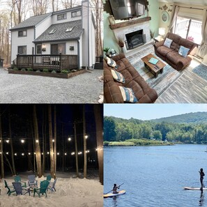 A house with a front porch, a living room with a fireplace, and a deck with chairs. - Cozy Bear Lair - Arrowhead Lake (Pocono Lake)