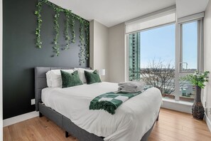 2 bedrooms, desk, iron/ironing board, travel crib - Downtown 2BR | Mountain Views • Free Parking • Banff Pass + Wine! (Calgary)