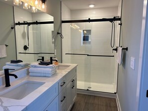 Shower, hair dryer, towels