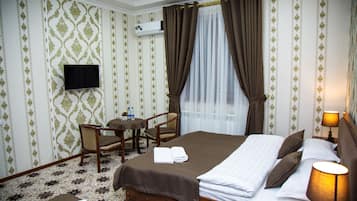 Deluxe Triple Room | 2 bedrooms, desk, laptop workspace, blackout drapes