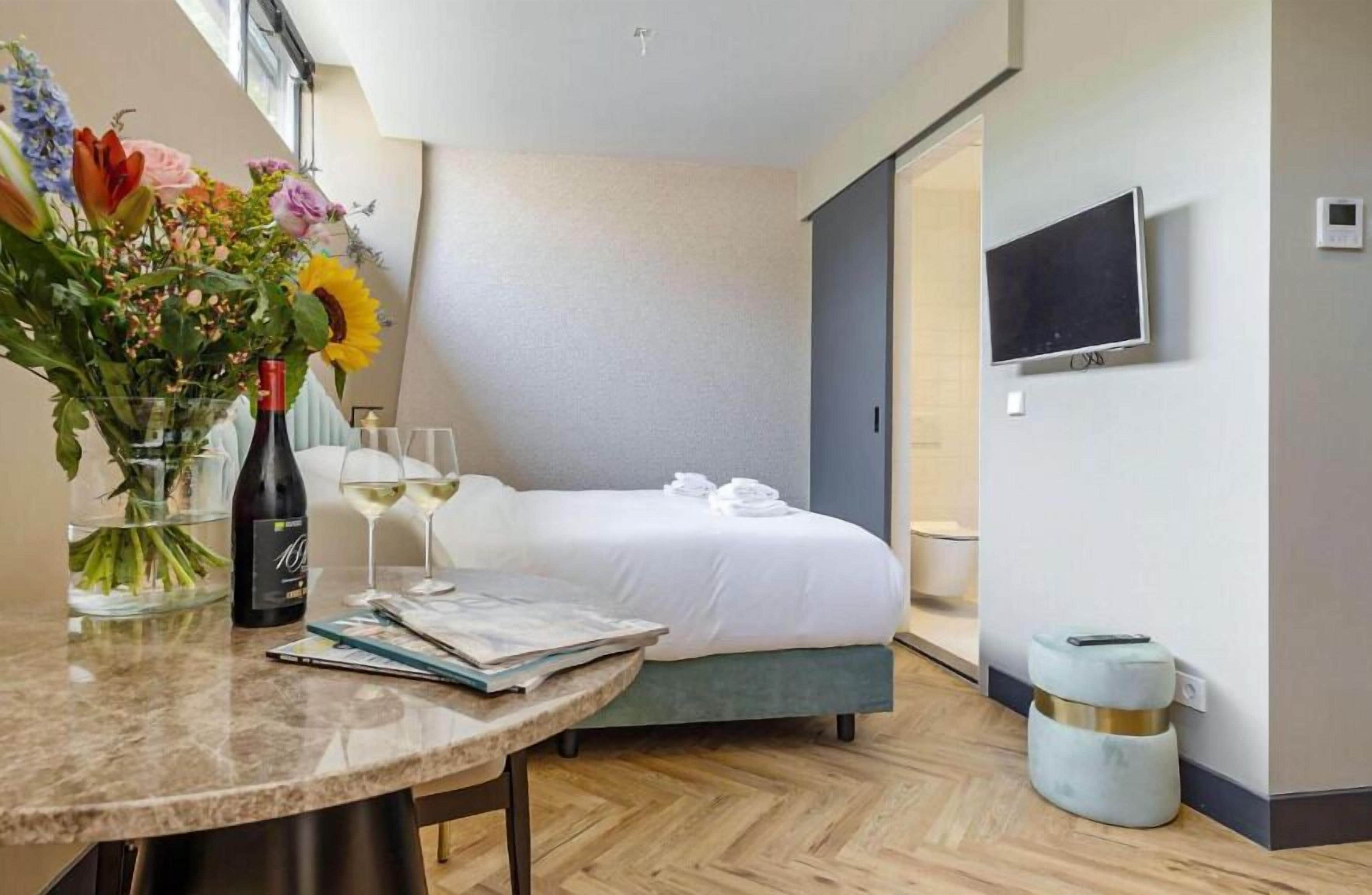 Hypoallergeen beddengoed, donzen dekbedden, een kluis op de kamer