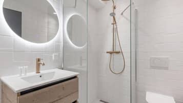 Shower, free toiletries, hair dryer, towels