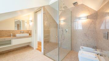 Shower, hair dryer, towels, soap