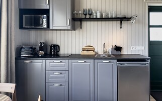 高级小屋 | 私人厨房 | 迷你冰箱、微波炉、洗碗机、意式浓缩咖啡机