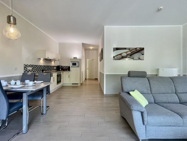 Condo | Living area | Flat-screen TV, heated floors