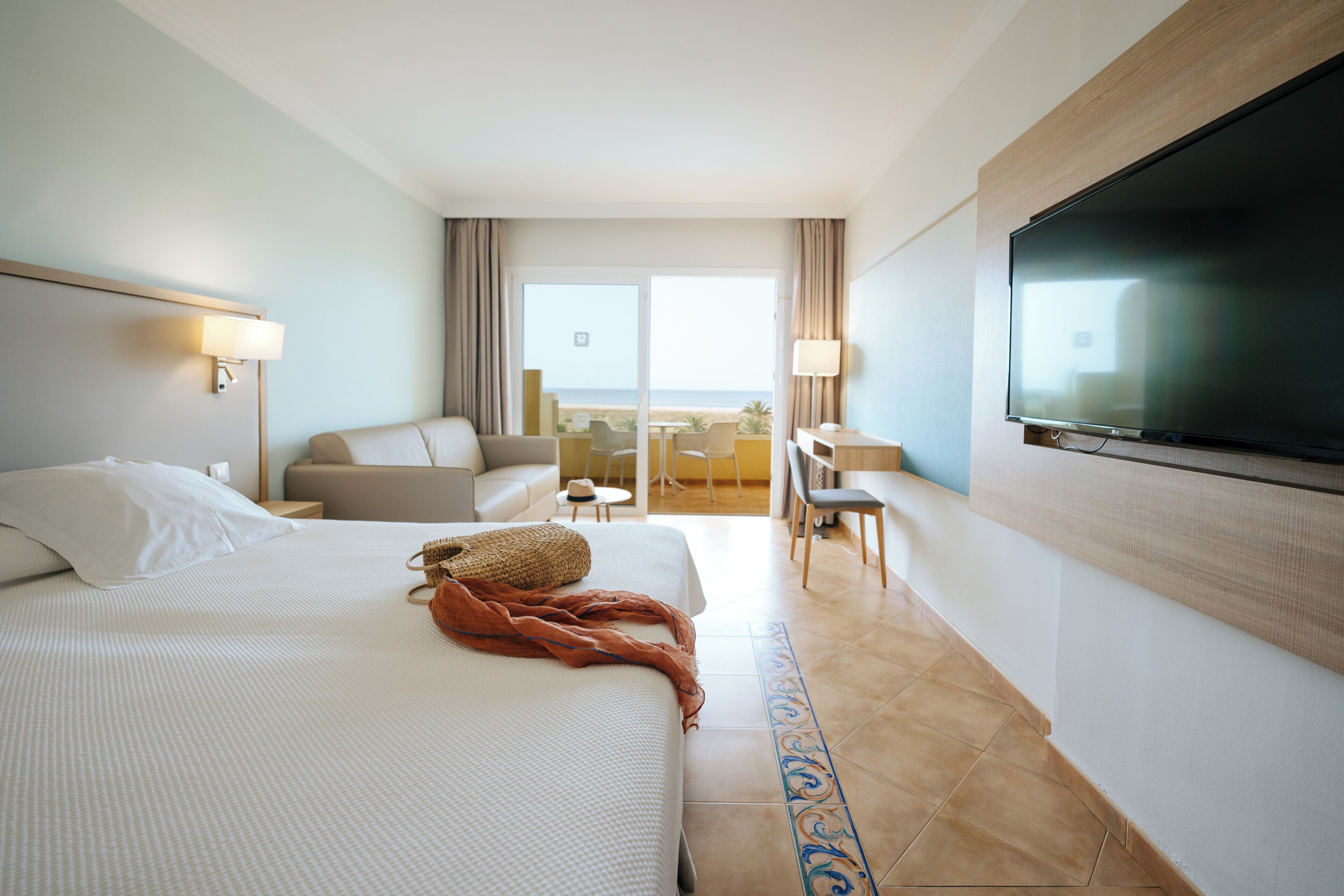 Minibar, desk, bed sheets