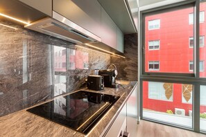 Fridge, oven, coffee/tea maker, toaster