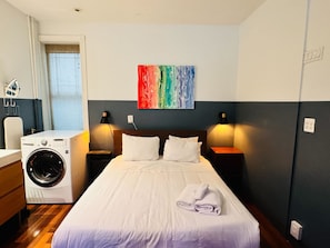 1 bedroom, desk, iron/ironing board, travel crib