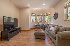 Smart TV, fireplace, foosball, books