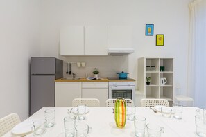 Fridge, oven, electric kettle, cookware/dishes/utensils