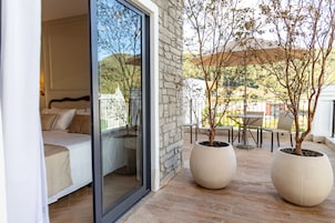 Habitación Deluxe, 1 cama de matrimonio grande | 1 dormitorio, ropa de cama de alta calidad, sistema de insonorización