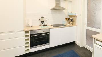 Fridge, electric kettle, toaster, cookware/dishes/utensils