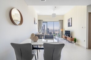 Apartment | Living area | 37-inch flat-screen TV with satellite channels, Netflix - The Downtown Dubai Collection (Dubai)