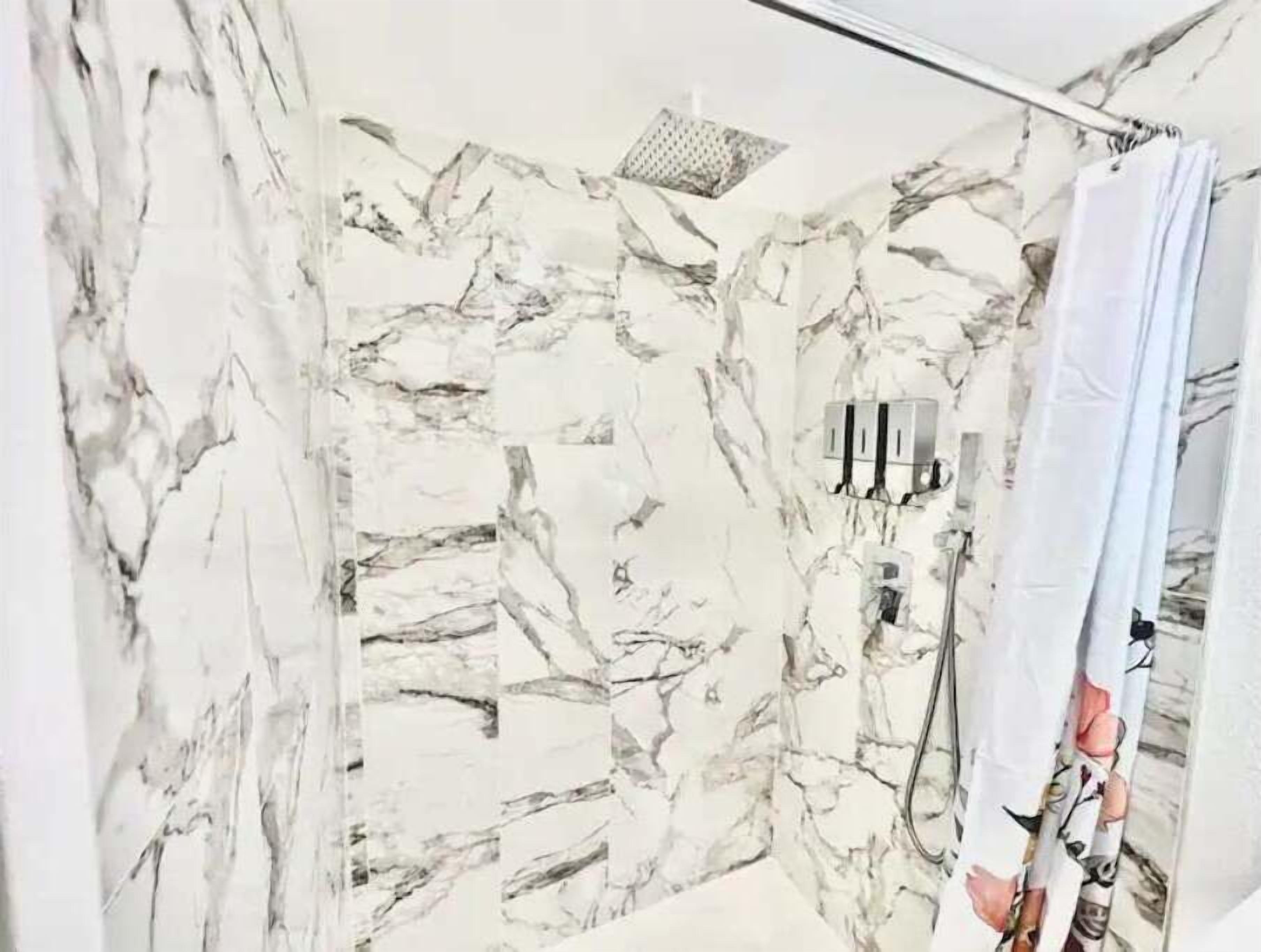 Hair dryer, towels, soap, shampoo