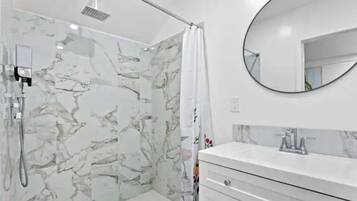 Hair dryer, towels, soap, shampoo