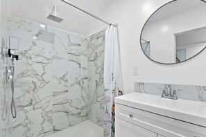 Hair dryer, towels, soap, shampoo