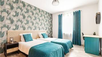 3 slaapkamers, een bureau, een strijkplank/strijkijzer, wifi