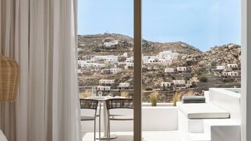 Junior Jetted Tub Suite with Side Sea View | 1 bedroom, premium bedding, minibar, in-room safe