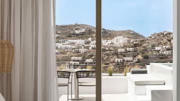 Junior Jetted Tub Suite with Side Sea View | 1 bedroom, premium bedding, minibar, in-room safe