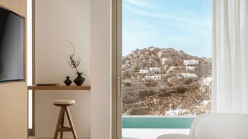 Suite with Individual Pool | 1 bedroom, hypo-allergenic bedding, down duvets, minibar