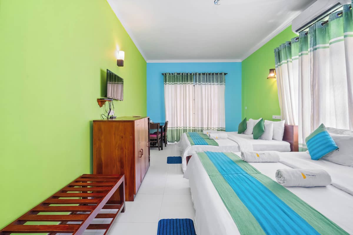 Deluxe Quadruple Room | Premium bedding, desk, laptop workspace, WiFi (free)