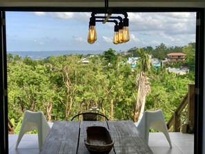 Dining - Minutes from the beach, modern home with ocean views. Pet friendly!   (Rincón)