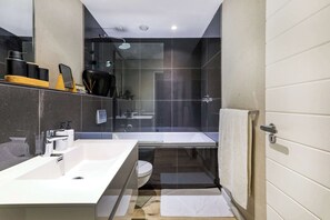 Shower, hair dryer, towels