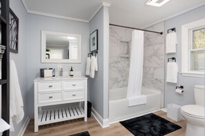 Hair dryer, towels, soap, shampoo