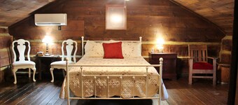 Rustic Retreat, a pre Civil War log cabin.
