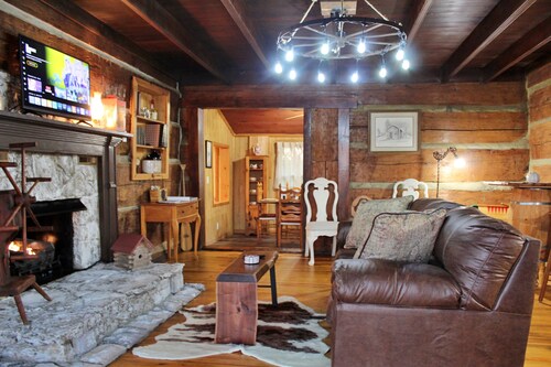 Rustic Retreat, a pre Civil War log cabin.