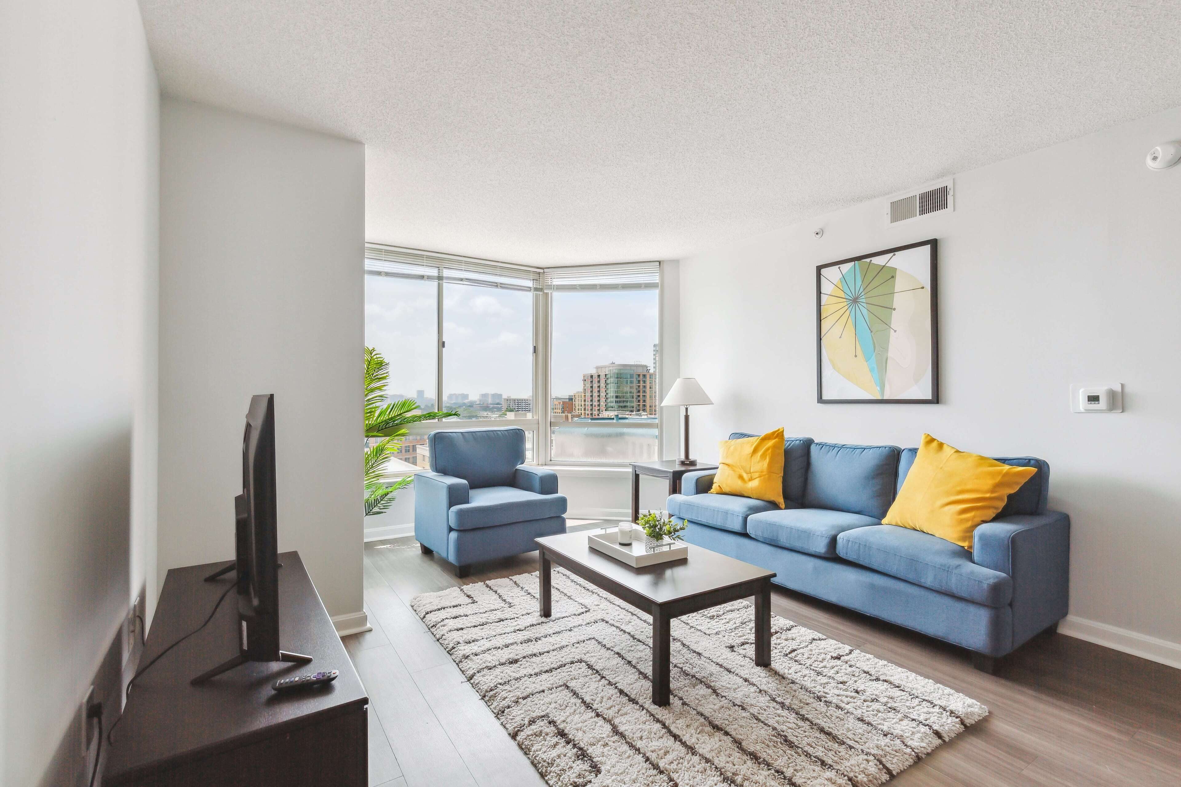 Comfort Apartment | Living area | 70-inch TV with digital channels