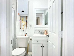 Hair dryer, towels, soap, shampoo