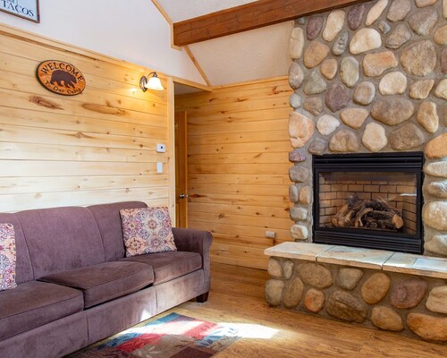 Located on the river, facing the Mountains