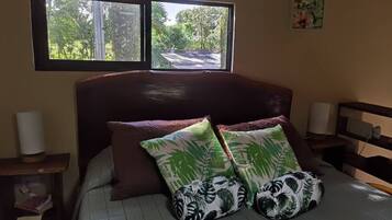 1 bedroom, desk, iron/ironing board, travel crib