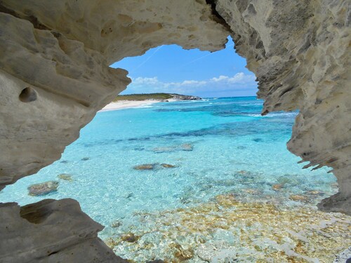 Beachfront family home steps from the perfect secluded ocean beach. 