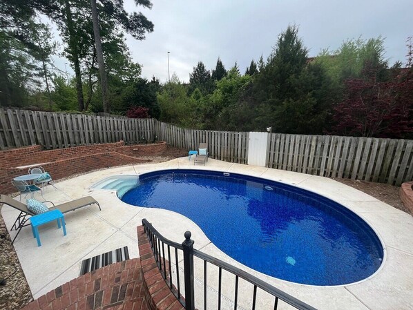 Pool - 3 bedroom, 2.5 bathroom patio home with an inground pool. <br>The sleeping arrangements at this property include three queen beds and a futon located in the second living room. (Augusta)