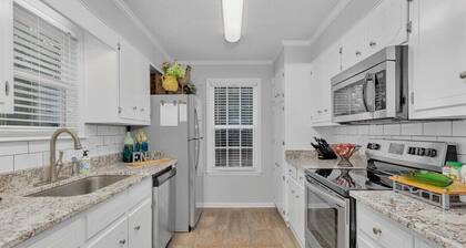 2-bedroom home with 1.5 bathrooms and fully fenced backyard. The sleeping arrangements are 1 king bed and 1 queen bed.