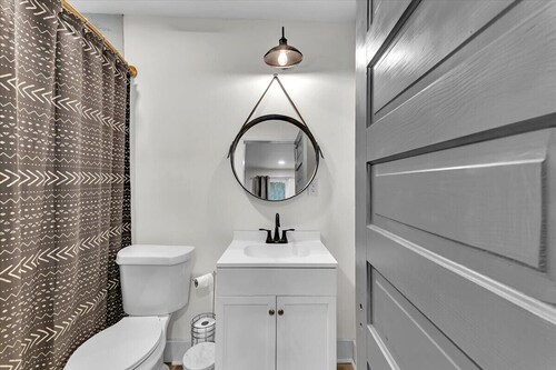 1 bed 1 bath home that sleeps max 4 guests with sleeping arrangements being a queen bed and a fold out couch that is queen sized.