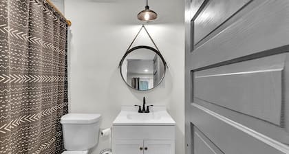 1 bed 1 bath home that sleeps max 4 guests with sleeping arrangements being a queen bed and a fold out couch that is queen sized.
