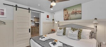 1 bedroom, 1 bathroom sleeps max 4 guests with the sleeping arrangements being a king bed and futon that sleeps 2