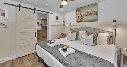 1 bedroom, 1 bathroom sleeps max 4 guests with the sleeping arrangements being a king bed and futon that sleeps 2