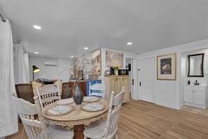 Dining - 1 bedroom, 1 bathroom sleeps max 4 guests with the sleeping arrangements being a king bed and futon that sleeps 2 (Augusta)