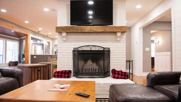 Smart TV, fireplace, books