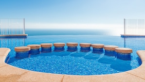 A infinity pool with a clear view of the horizon, surrounded by stone steps and metal railings. - Casa de la Vista, Best Panoramic View on the Mediterranean (Benitachell)