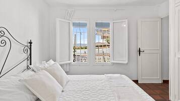 2 dormitorios, tabla de planchar con plancha, wifi gratis y ropa de cama
